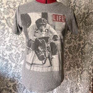 Monkey riding a bike t-shirt